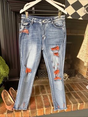 Women's Distressed Blue Denim Jeans with Orange Patch Details